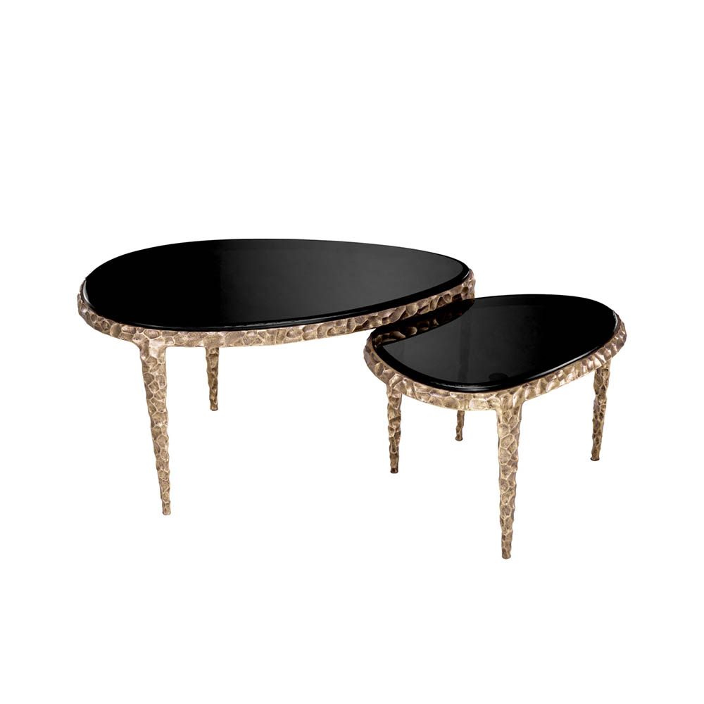 Decadent black top coffee tables with textured brass base