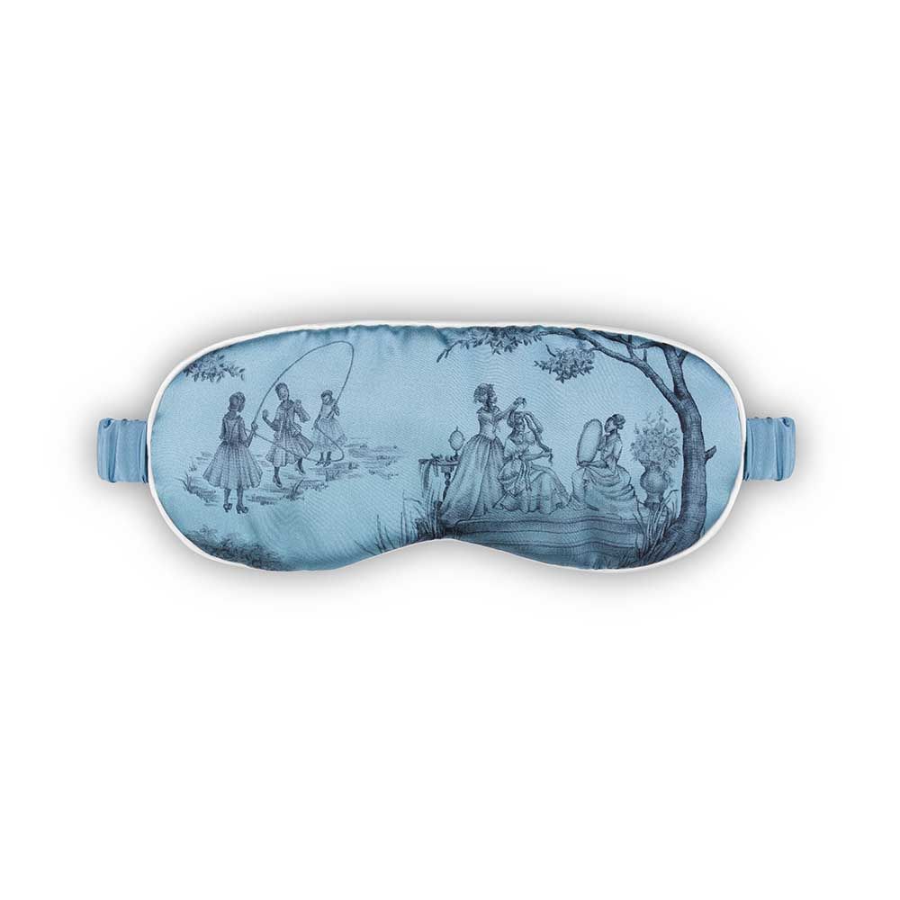 Blue silk eye mask with black traditional artistry