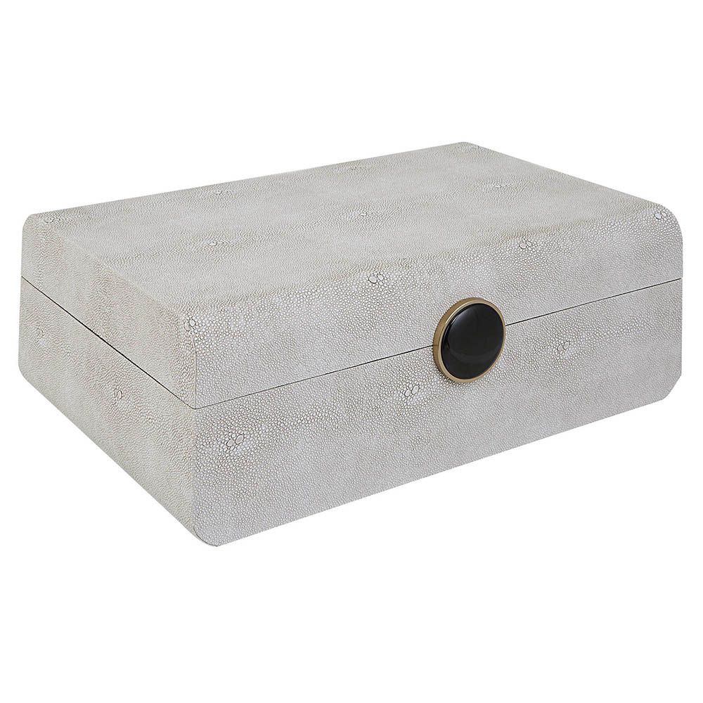 A stylish shagreen box with a white finish and black enamel closure