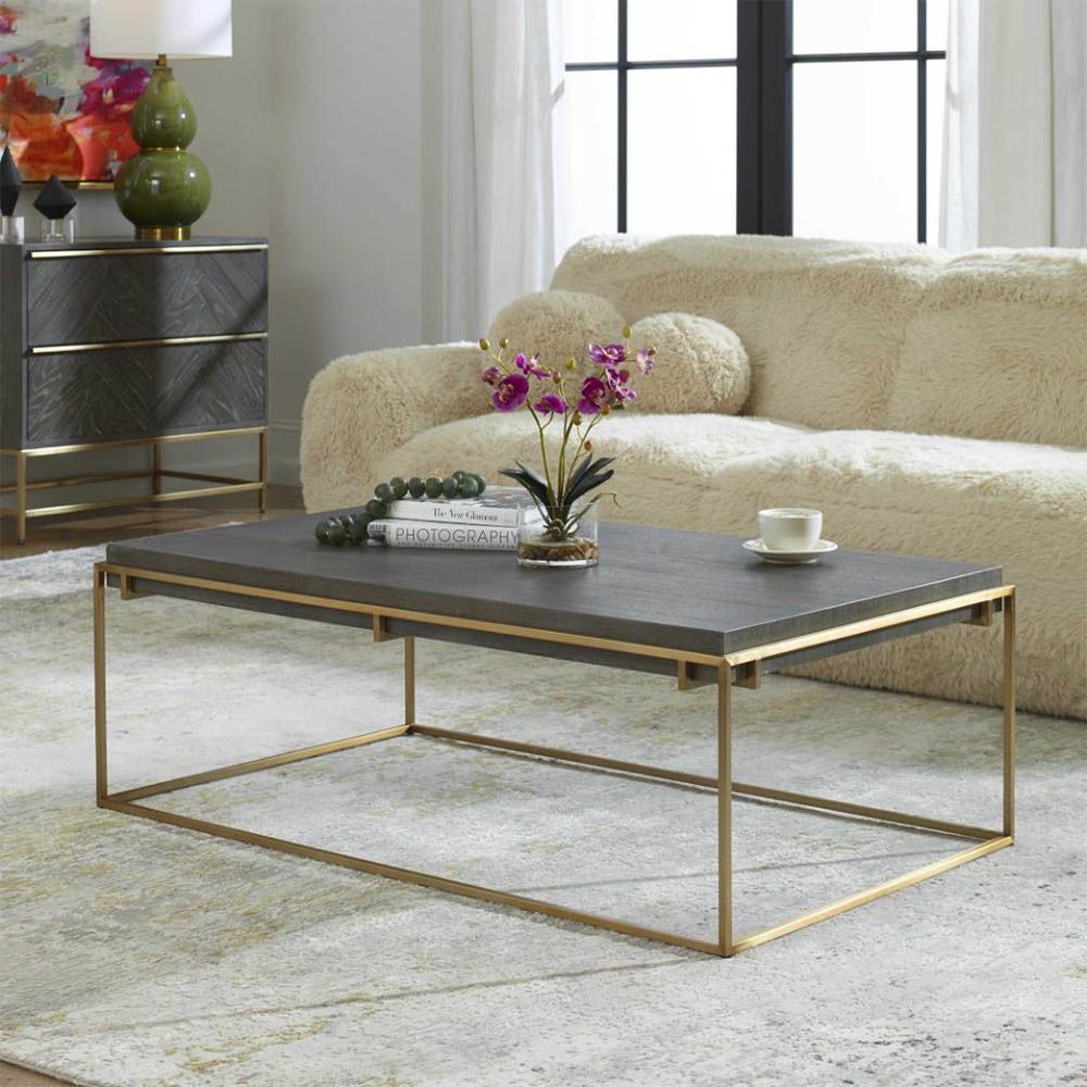 Sleek and sophisticated brass coffee table with square wooden top