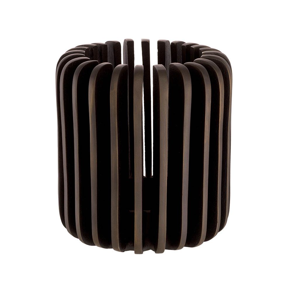 A unique candle holder by Eichholtz with a rustic and sophisticated finish