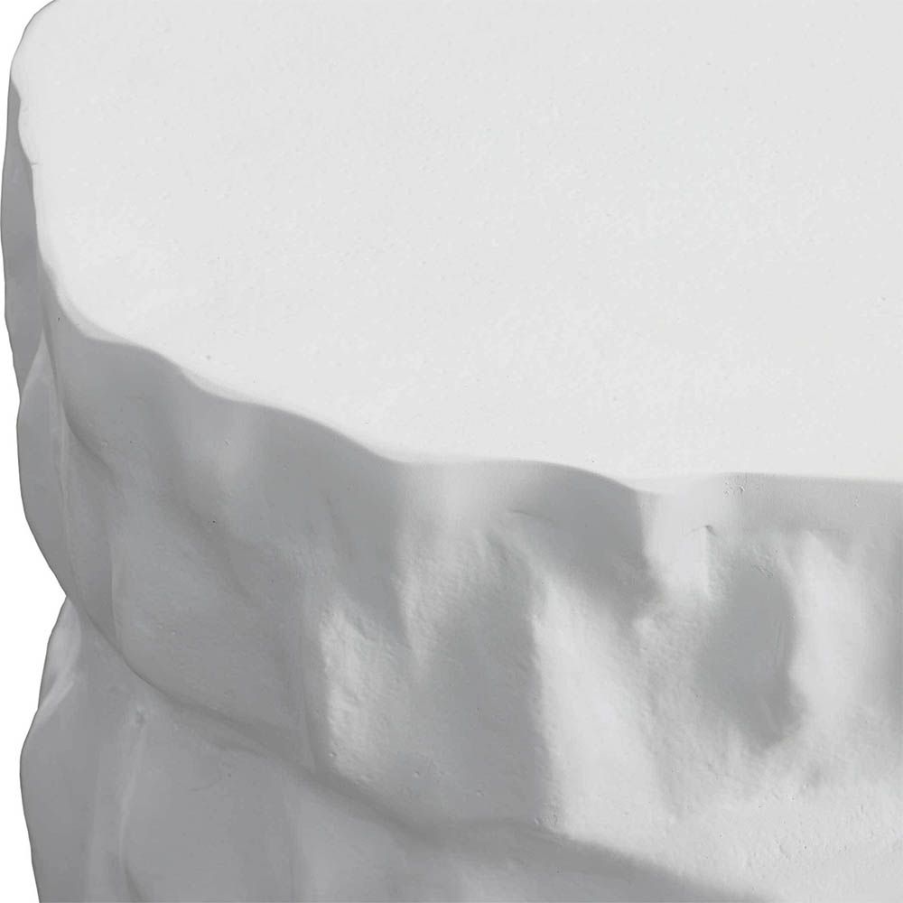 Textured tree trunk-like side table with chalky white finish