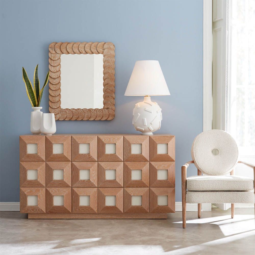 Brown wooden buffet with leather inset panels