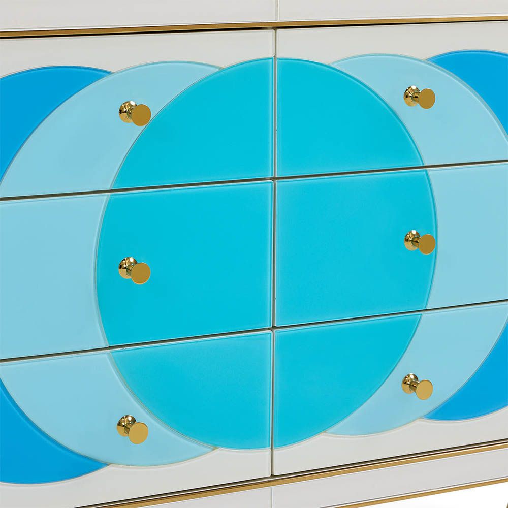 White console table with blue circle pattern