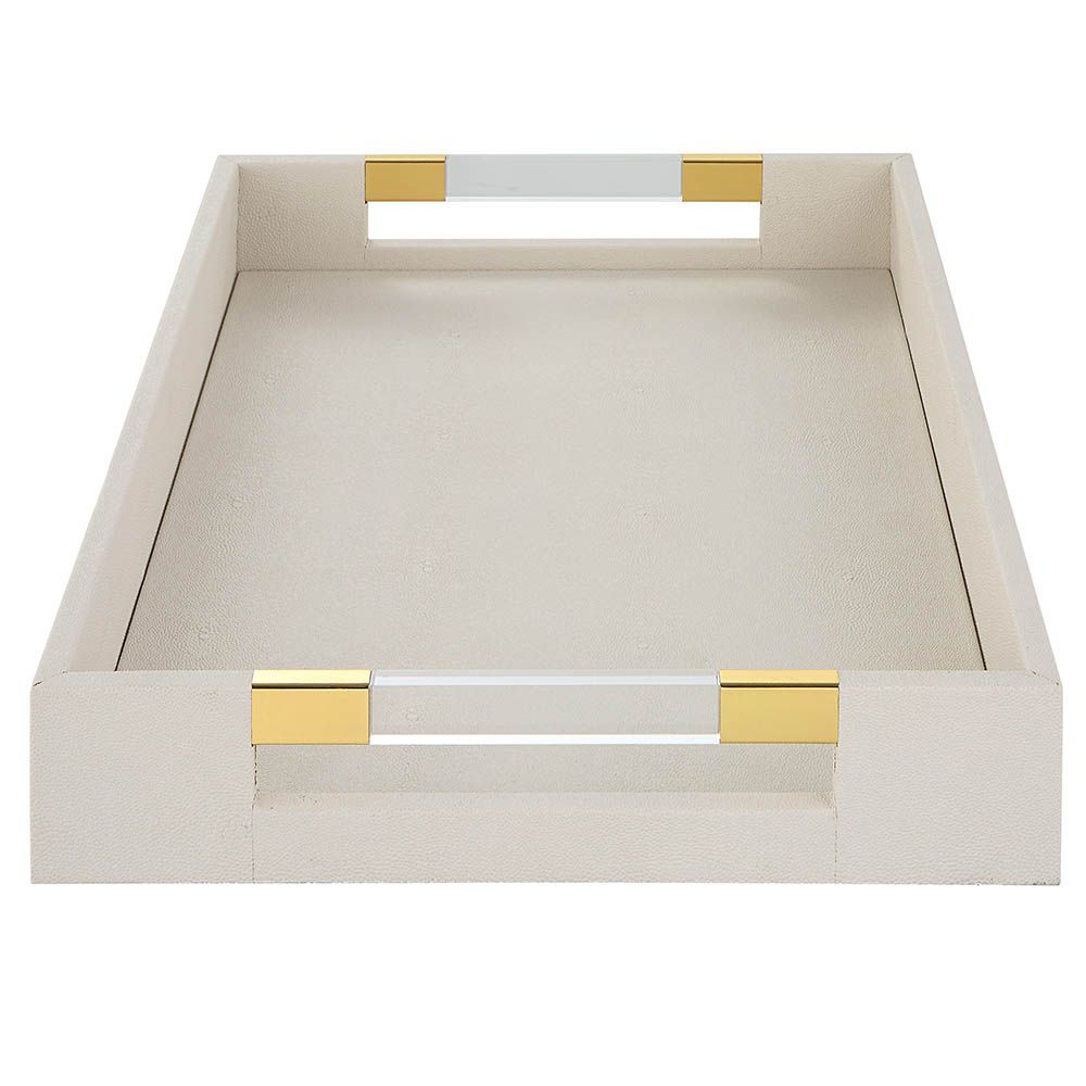 A sophisticated faux shagreen tray with beautiful brass details