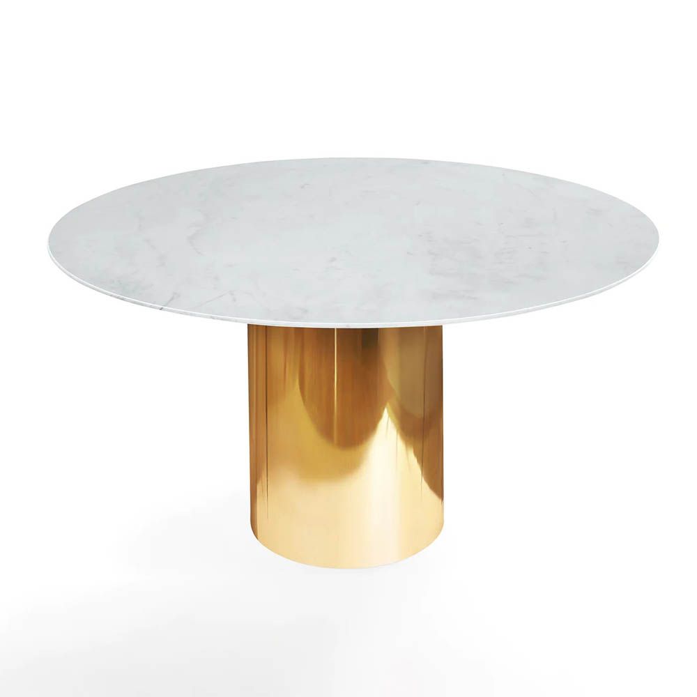 A glamorous dining table by Jonathan Adler with a brass base and marble top
