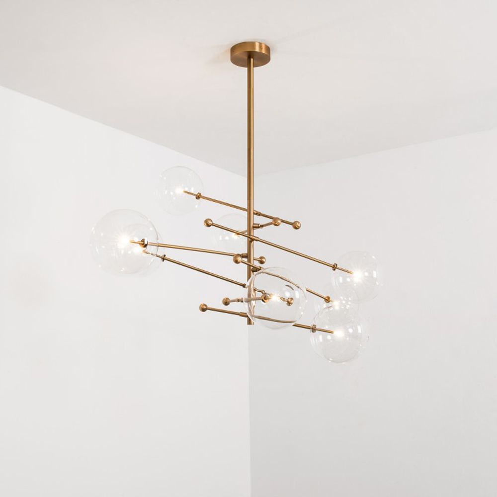 Retro natural brass finish 8 arm chandelier with 8 globe accents 