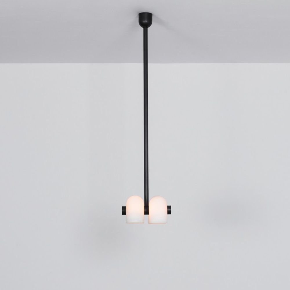 Industrial and modern style pendant ceiling lamp in a solid black brass finish