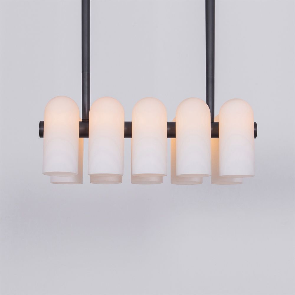 Black gunmetal finish solid brass chandelier with a parallel row of translucent glass shades