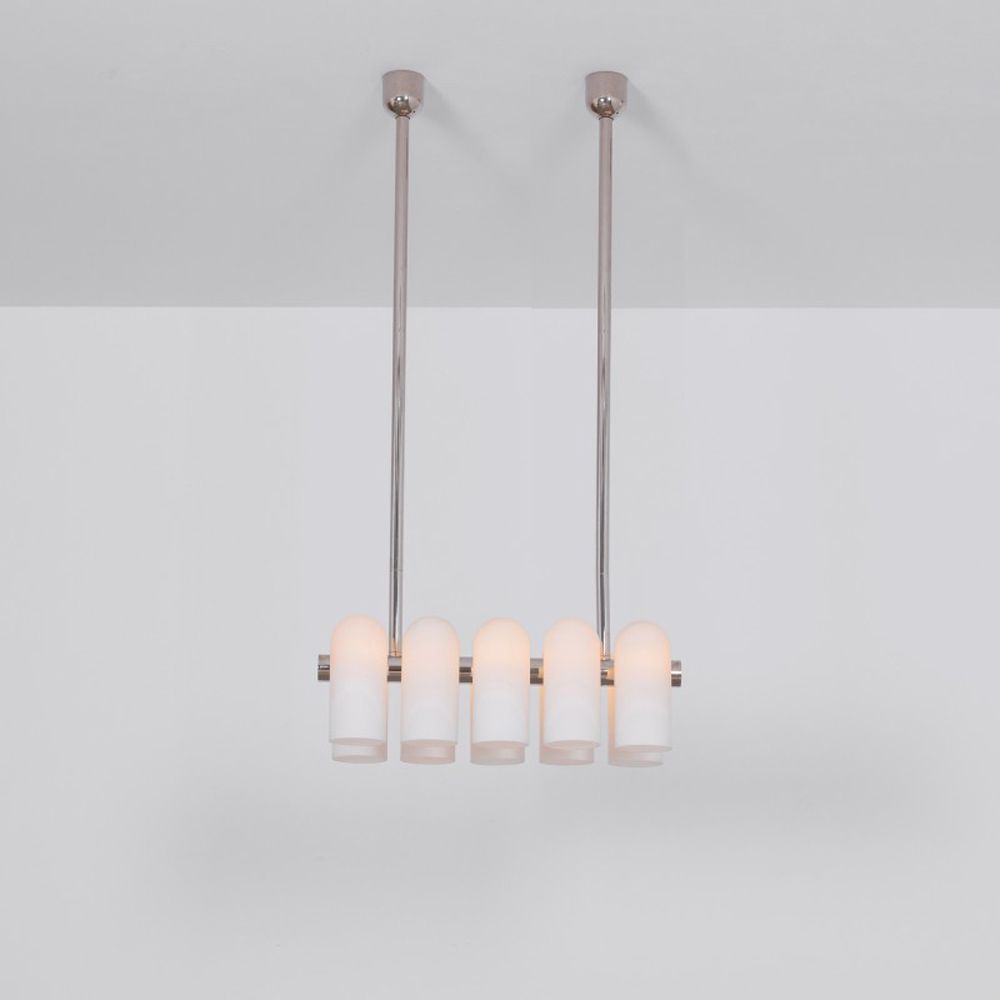 Contemporary polished nickel finish solid brass chandelier with a colonnade of translucent glass lampshades