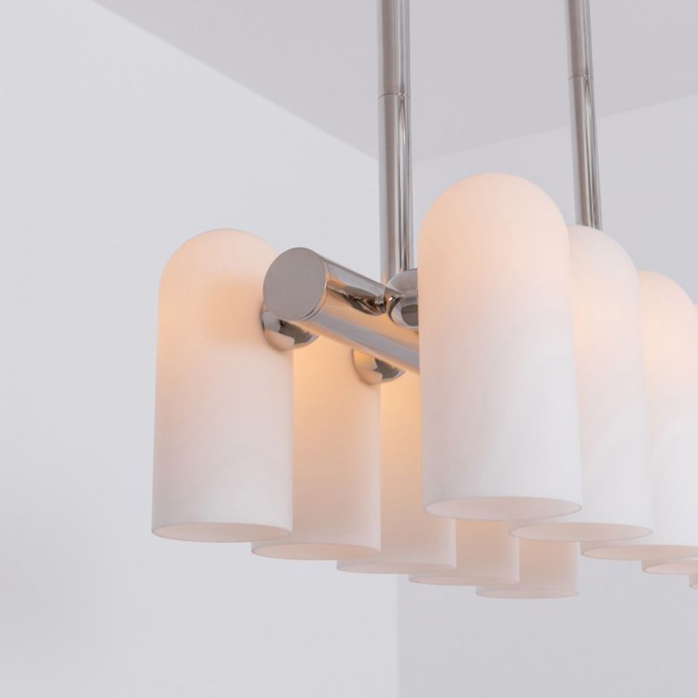 Contemporary polished nickel finish solid brass chandelier with a colonnade of translucent glass lampshades