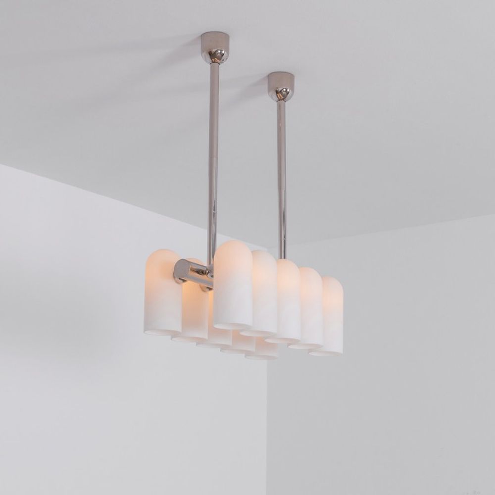 Contemporary polished nickel finish solid brass chandelier with a colonnade of translucent glass lampshades