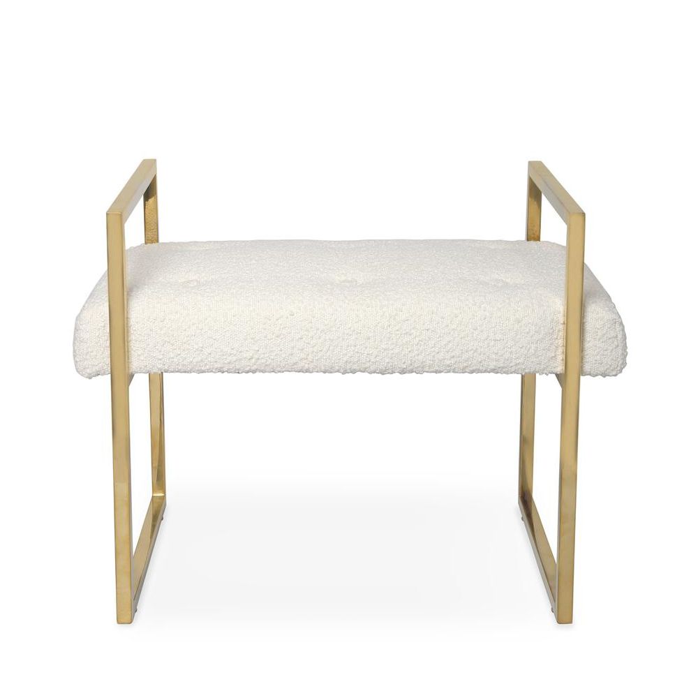 A chic boucle bench with a stylish brass frame