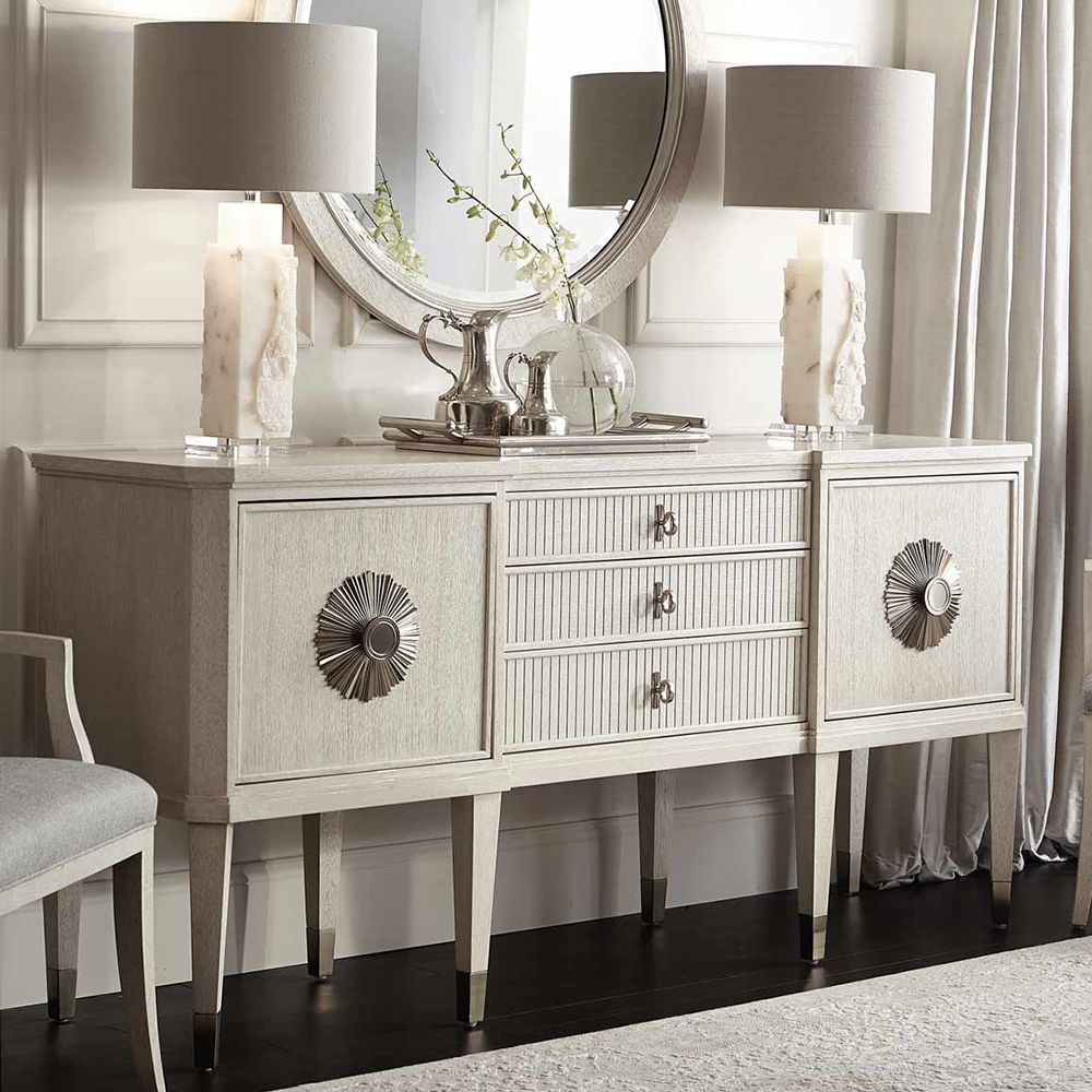 An exquisite sideboard with an elegant white finish, stunning silver highlights and floral inspired features