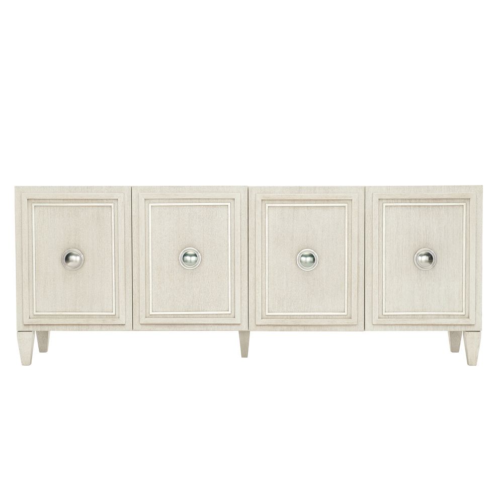 A chic natural wood tv and entertainment unit with 4 doors and metal fixtures