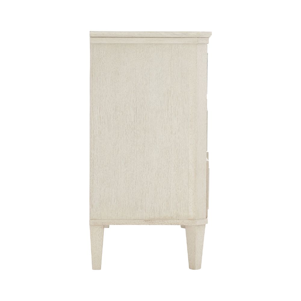 A luxury white oak veneer chest of drawers accentuated by antiqued mirrored glass panels with Silver Luster highlights and a Manor White finish