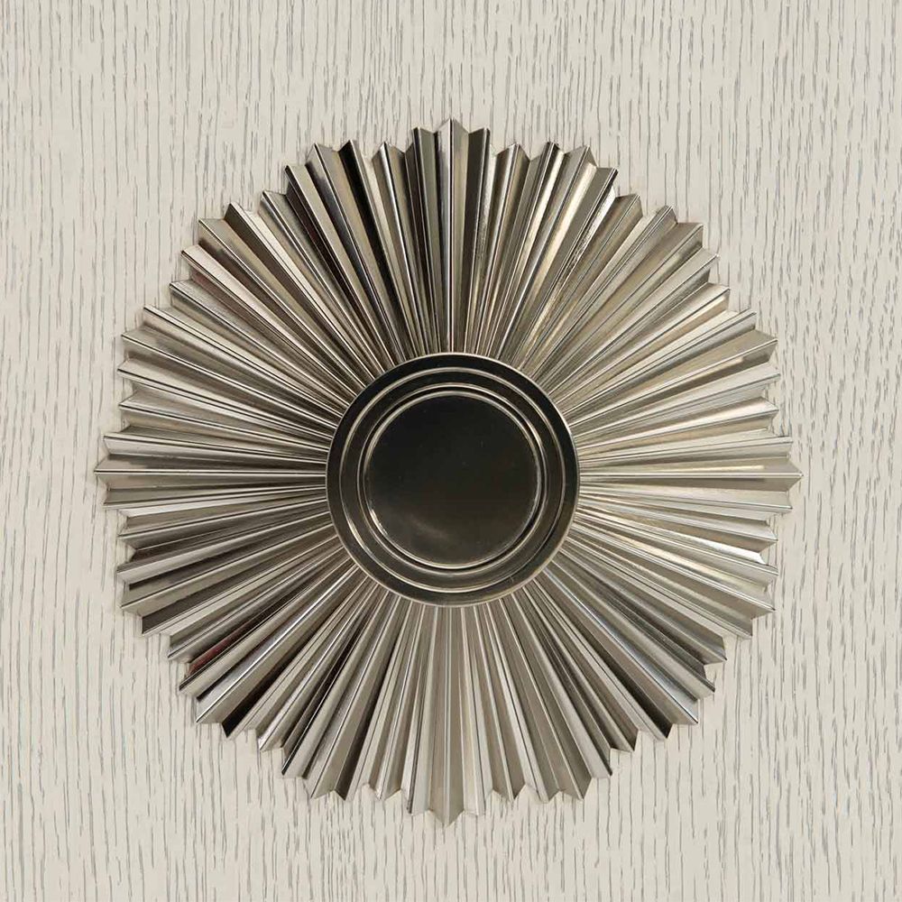 An exquisite sideboard with an elegant white finish, stunning silver highlights and floral inspired features