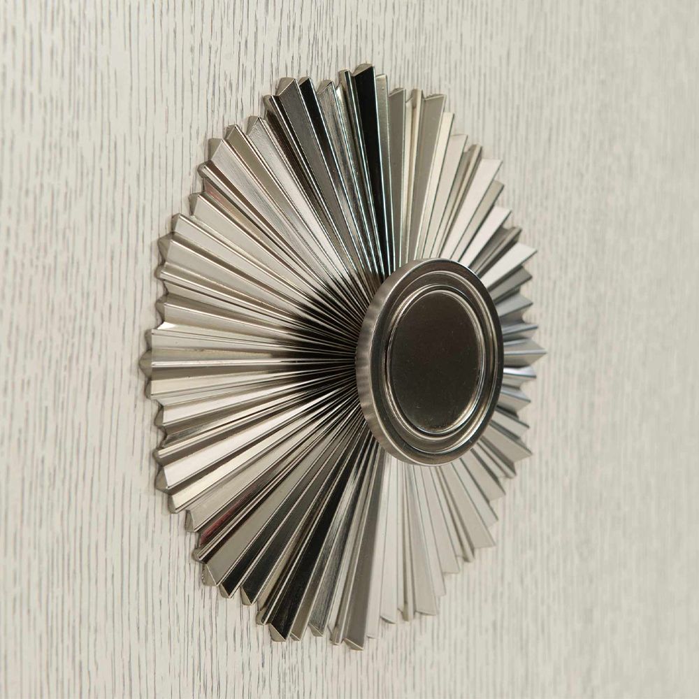 An exquisite sideboard with an elegant white finish, stunning silver highlights and floral inspired features