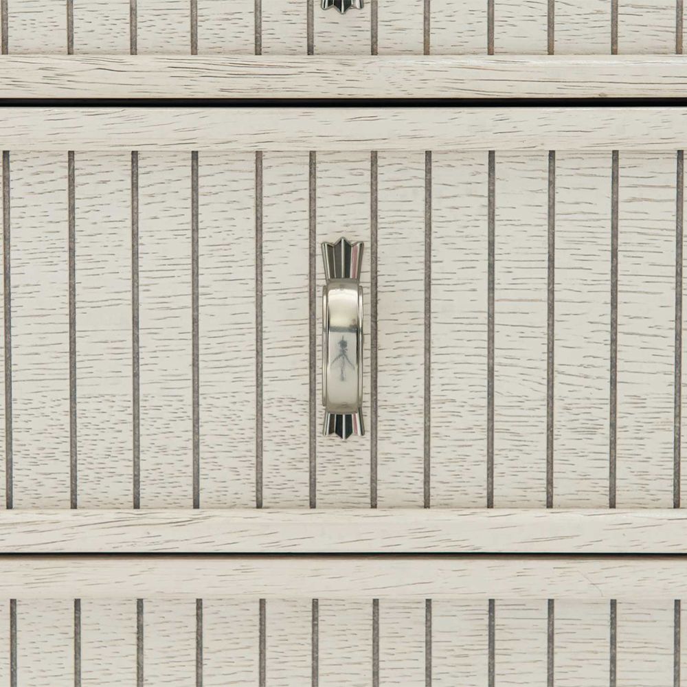 An exquisite sideboard with an elegant white finish, stunning silver highlights and floral inspired features
