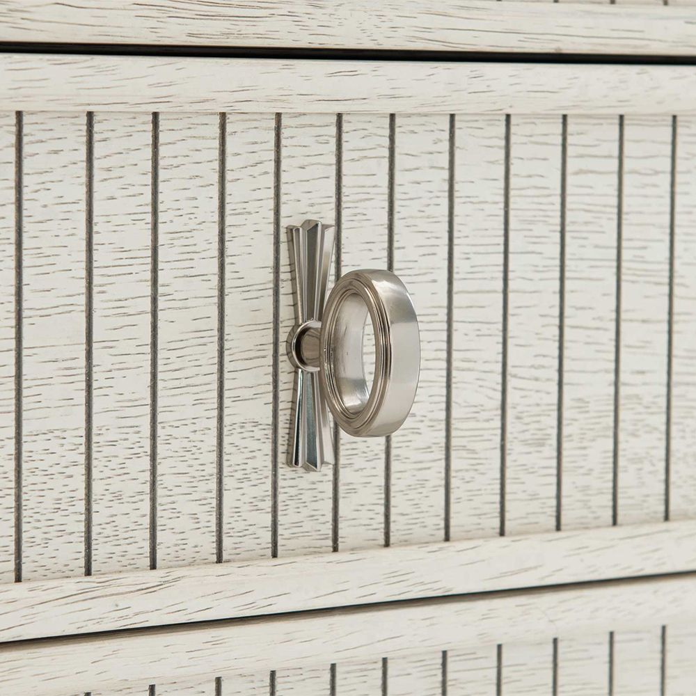 An exquisite sideboard with an elegant white finish, stunning silver highlights and floral inspired features