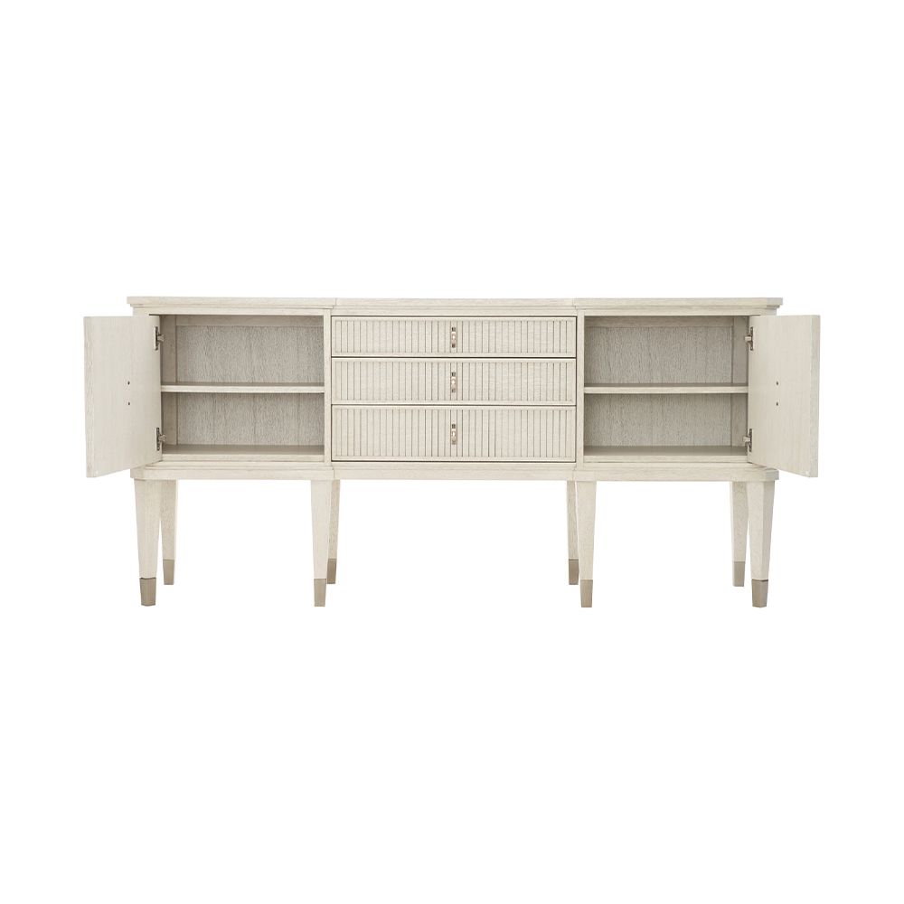 An exquisite sideboard with an elegant white finish, stunning silver highlights and floral inspired features