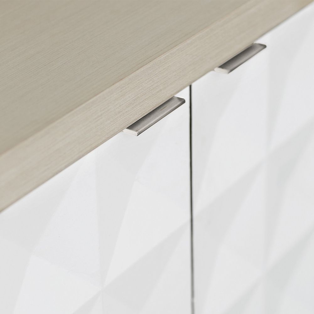 A sophisticated four door geometric patterned buffet with internal shelves and drawers