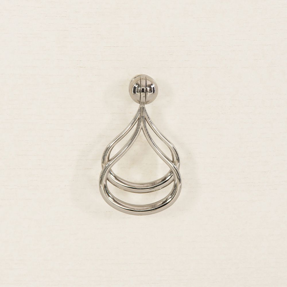 A contemporary entertainment unit with polished stainless steel accents, four drawers, two doors and internal shelving