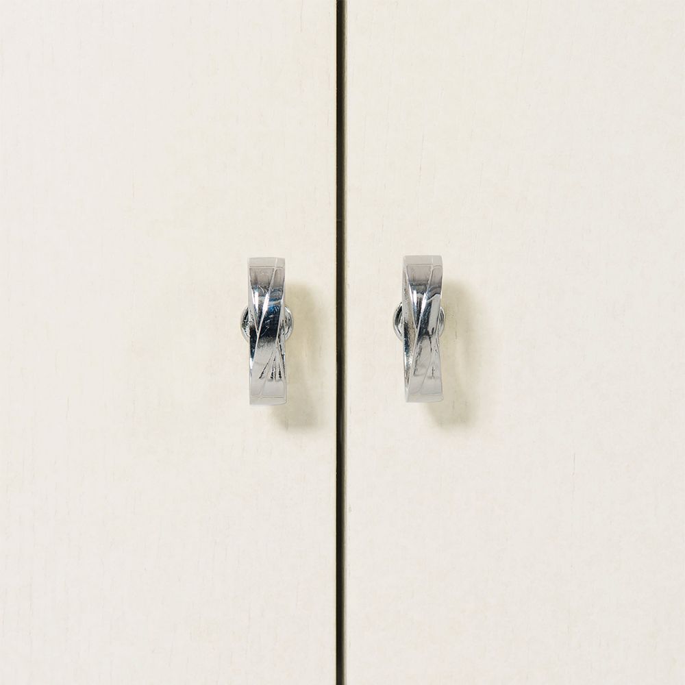 A contemporary entertainment unit with polished stainless steel accents, four drawers, two doors and internal shelving