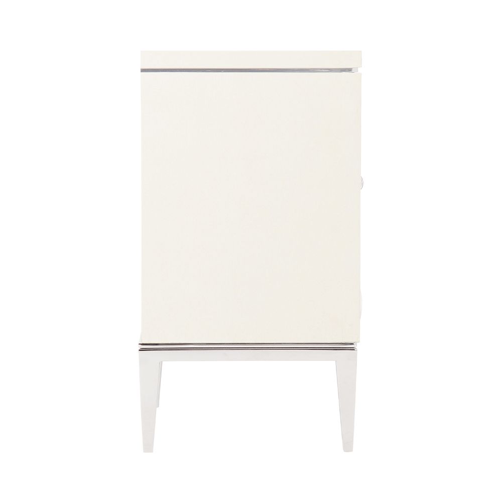 A contemporary entertainment unit with polished stainless steel accents, four drawers, two doors and internal shelving