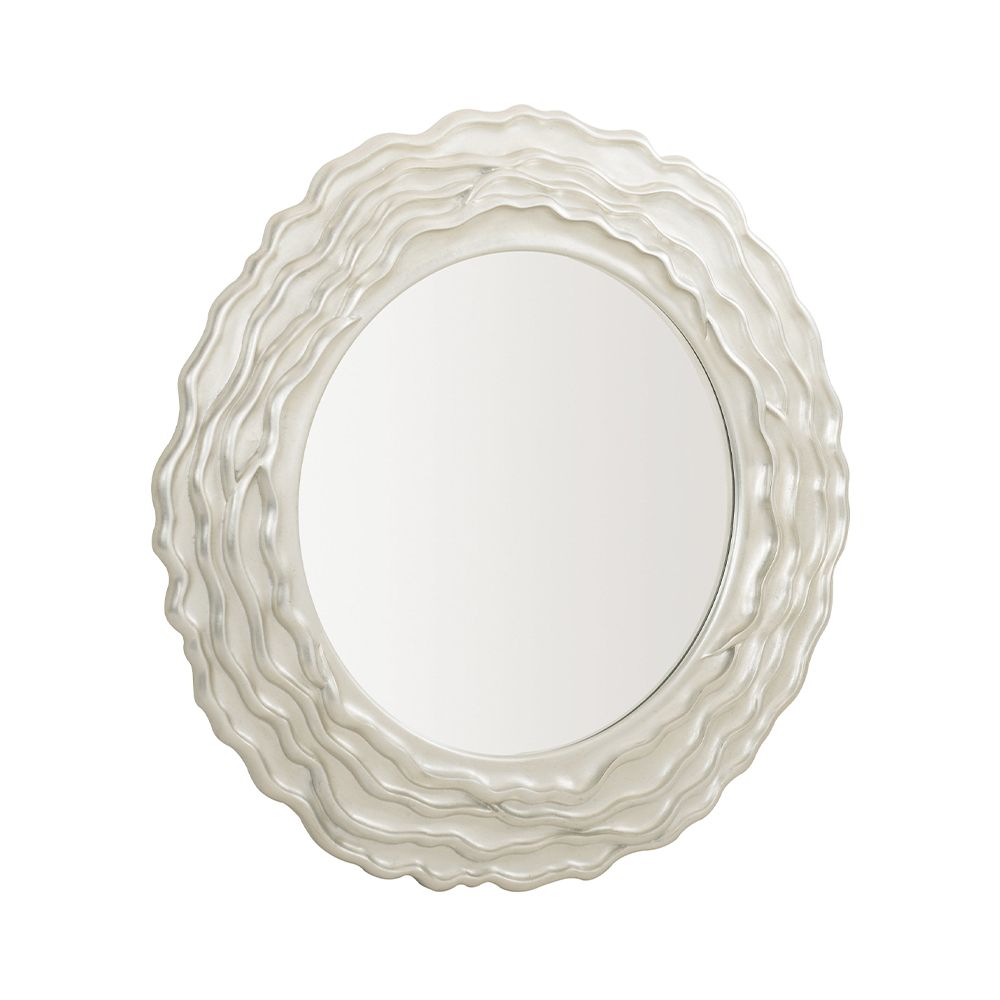 A gorgeous wall mirror featuring a textured wooden frame with layered waves and a silver finish