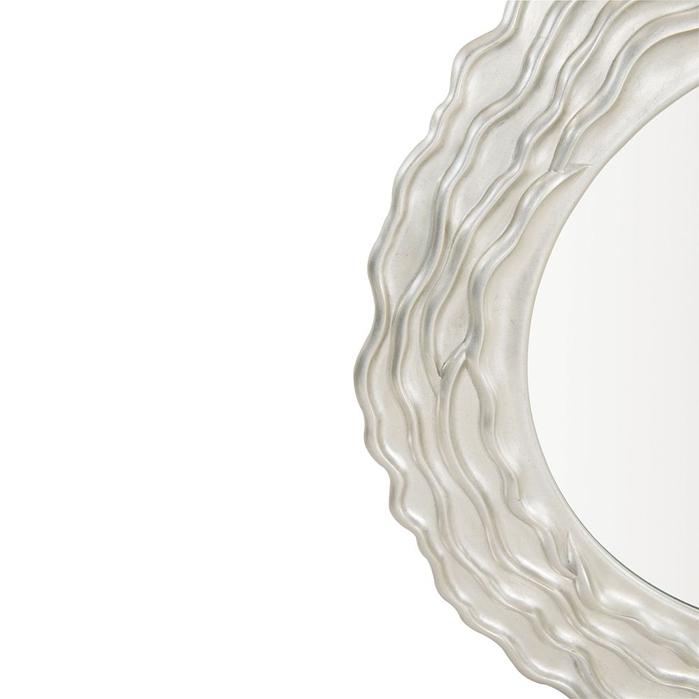 A gorgeous wall mirror featuring a textured wooden frame with layered waves and a silver finish