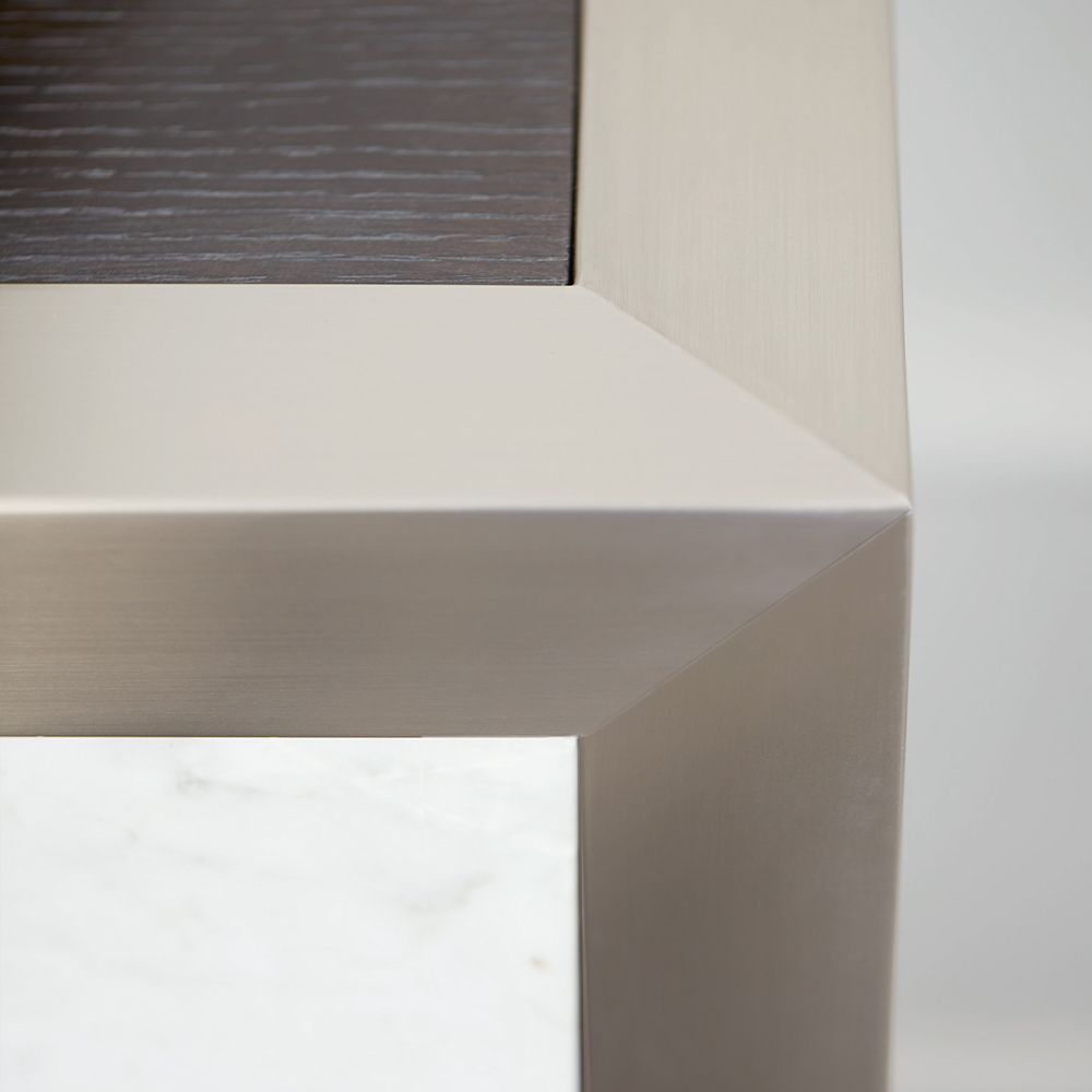 A sophisticated entertainment unit with four marble front doors, a dark brown top, silver frame and internal storage