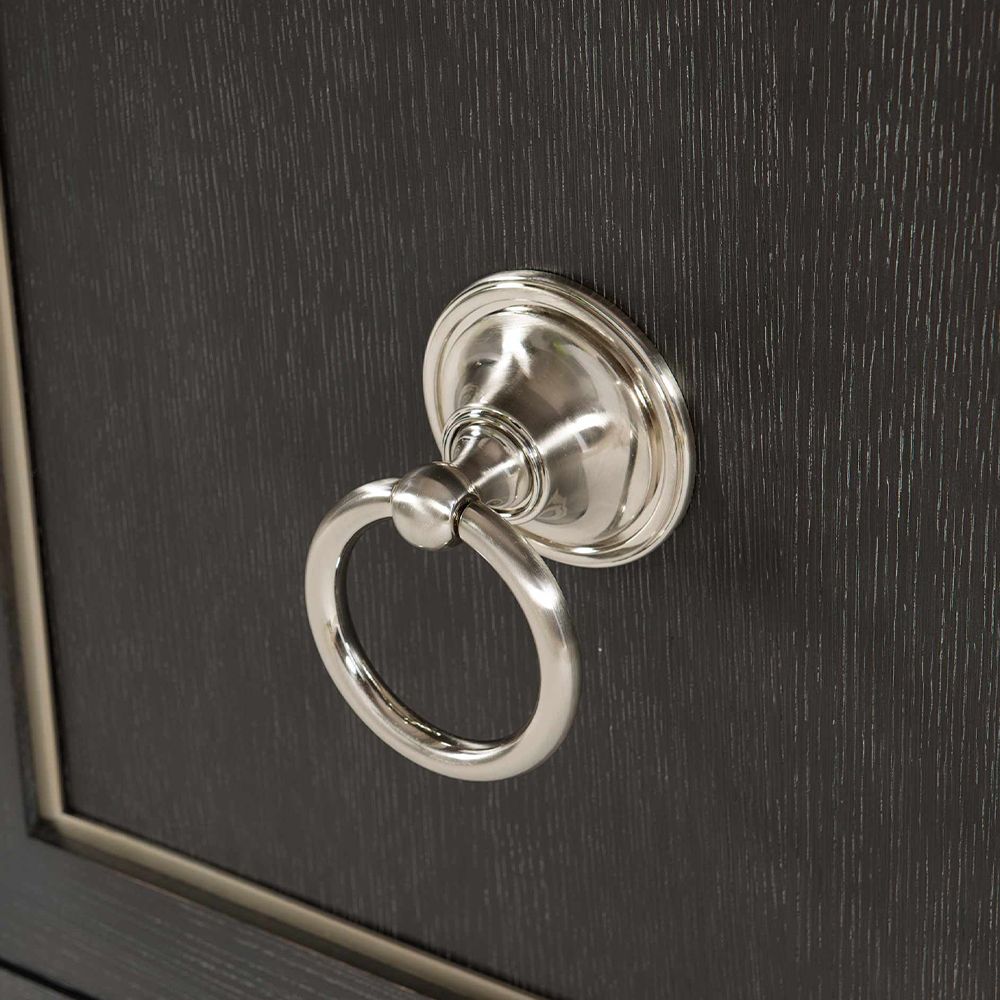 An elegant three door sideboard with a dark brown wooden finish and stylish stainless steel accents