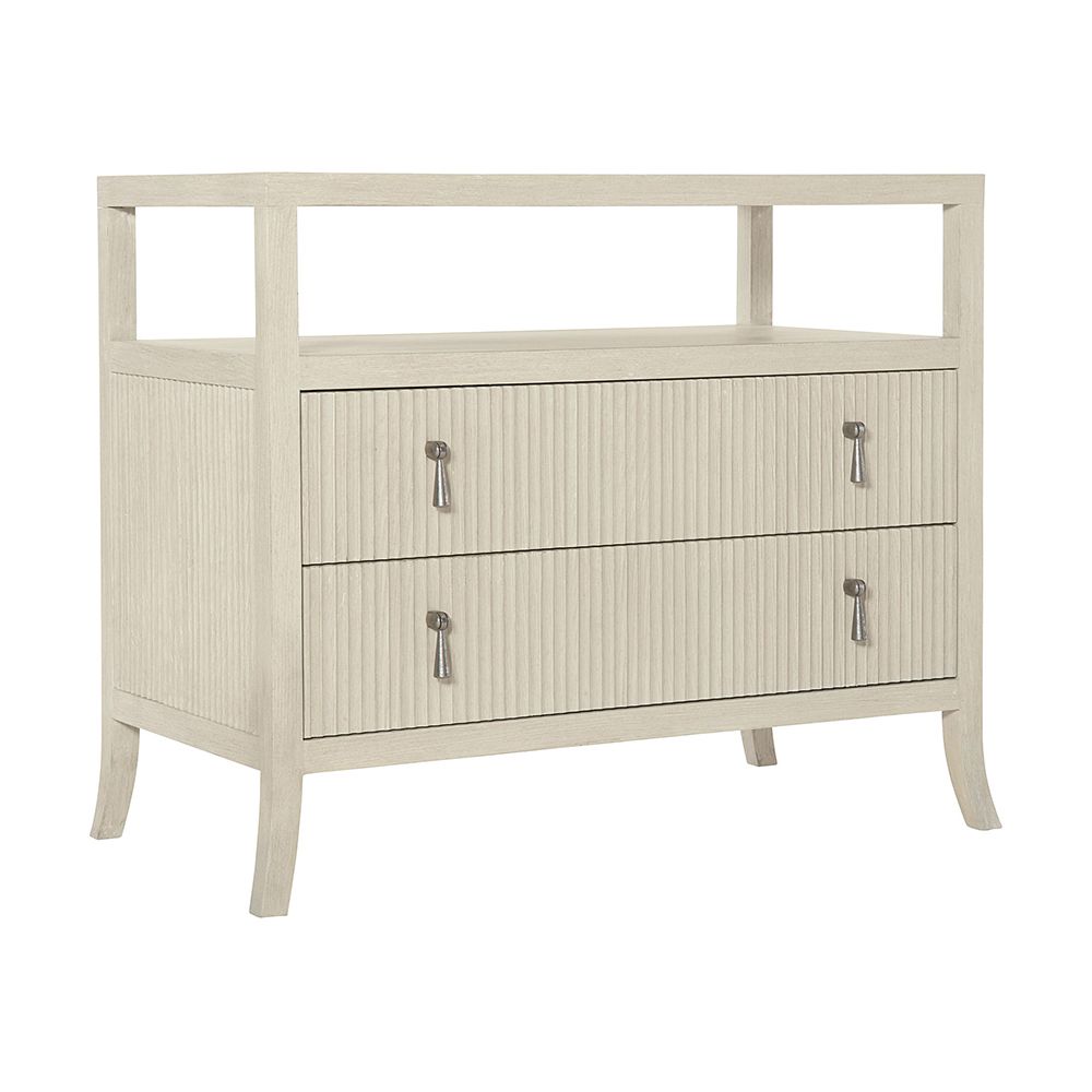 A beautiful two drawer bedside table with sophisticated indented drawer fronts