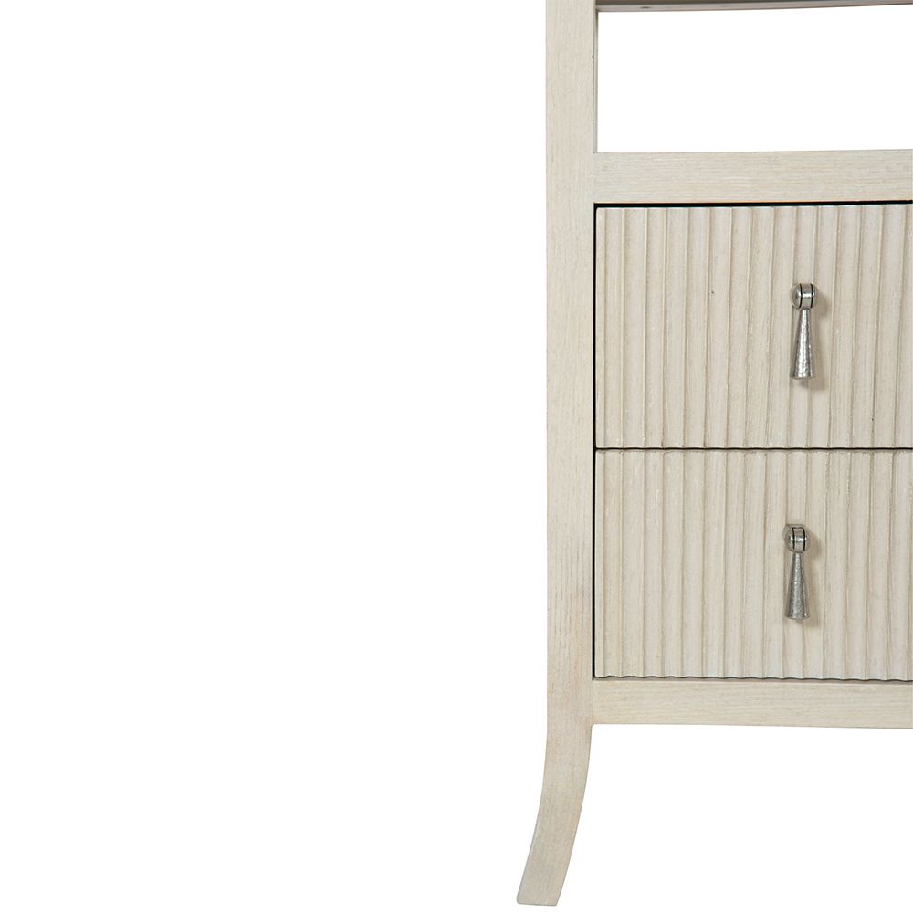 A beautiful two drawer bedside table with sophisticated indented drawer fronts