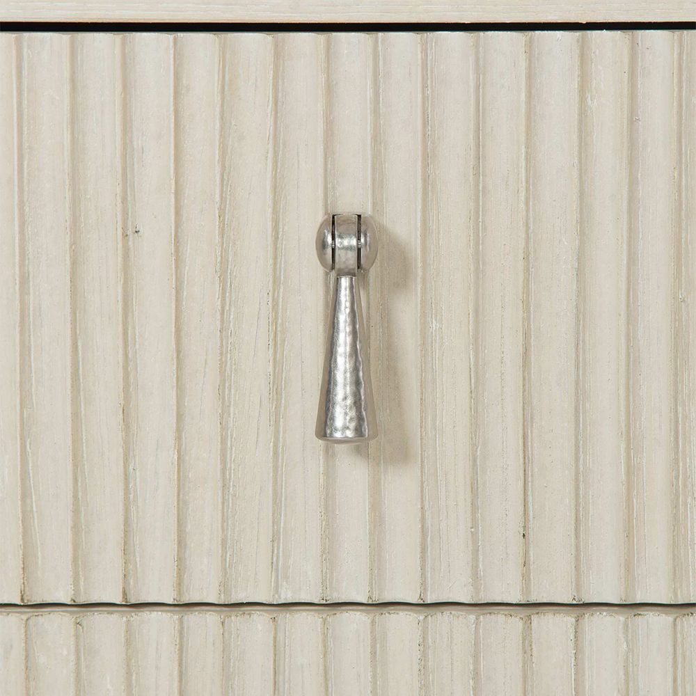 A beautiful two drawer bedside table with sophisticated indented drawer fronts