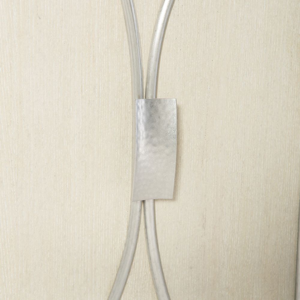 A stylish buffet with four curved silver metal framed overlaid doors and ample internal storage 