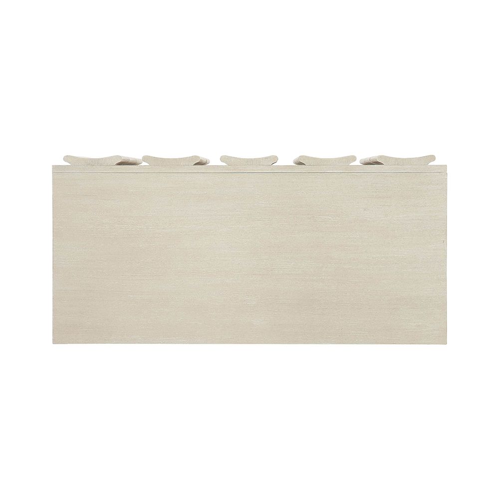 A unique three drawer chest by Bernhardt with shaped vertical overlays and a beautiful natural aged wood finish