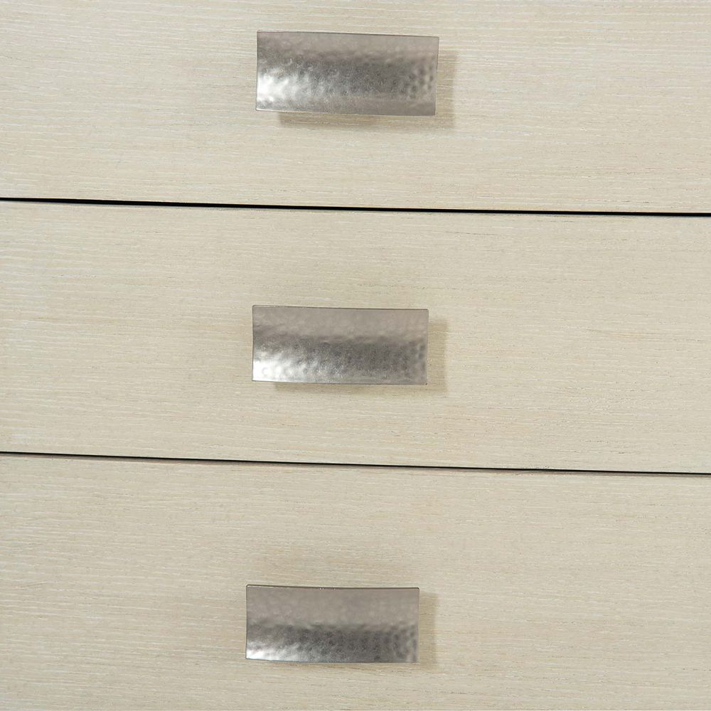 A beautiful chest of drawers from Bernhardt with five drawers and tarnished nickel handles 