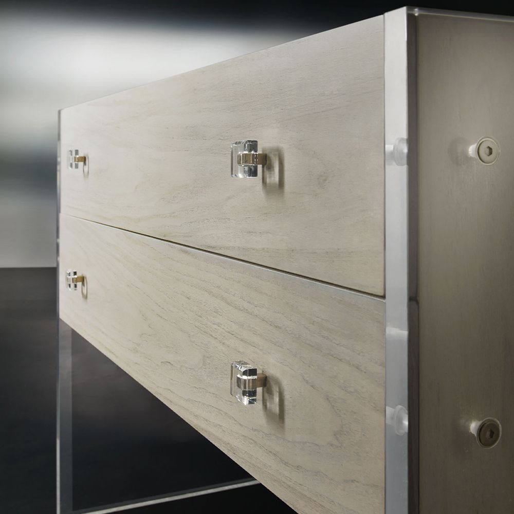 A beautiful two drawer bedside table from Bernhardt featuring a rustic bleached walnut veneer finish and acrylic end panels
