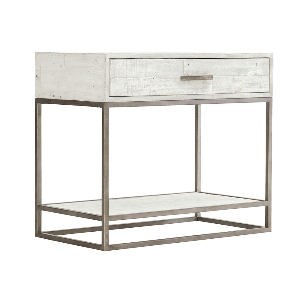 A contemporary, rustic one-drawer bedside table finished in a white wood with a glazed silver finish and featuring a planked bottom shelf