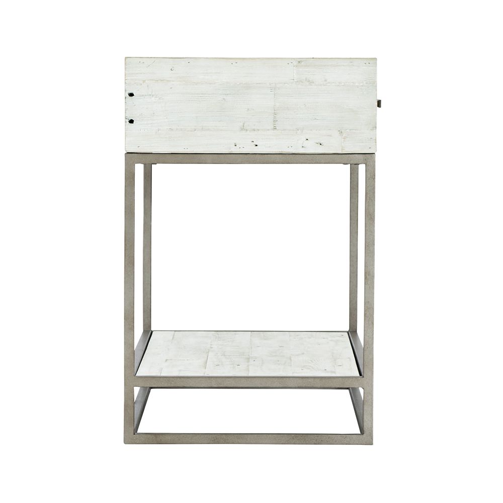 A contemporary, rustic one-drawer bedside table finished in a white wood with a glazed silver finish and featuring a planked bottom shelf