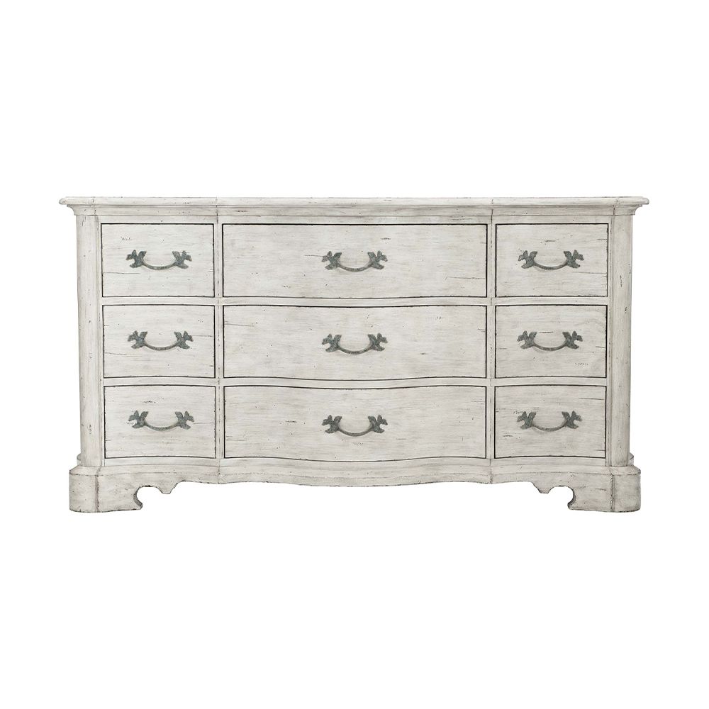 A beautiful and classic French style dresser with nine drawers and lovely curved front and ends from Bernhardt 