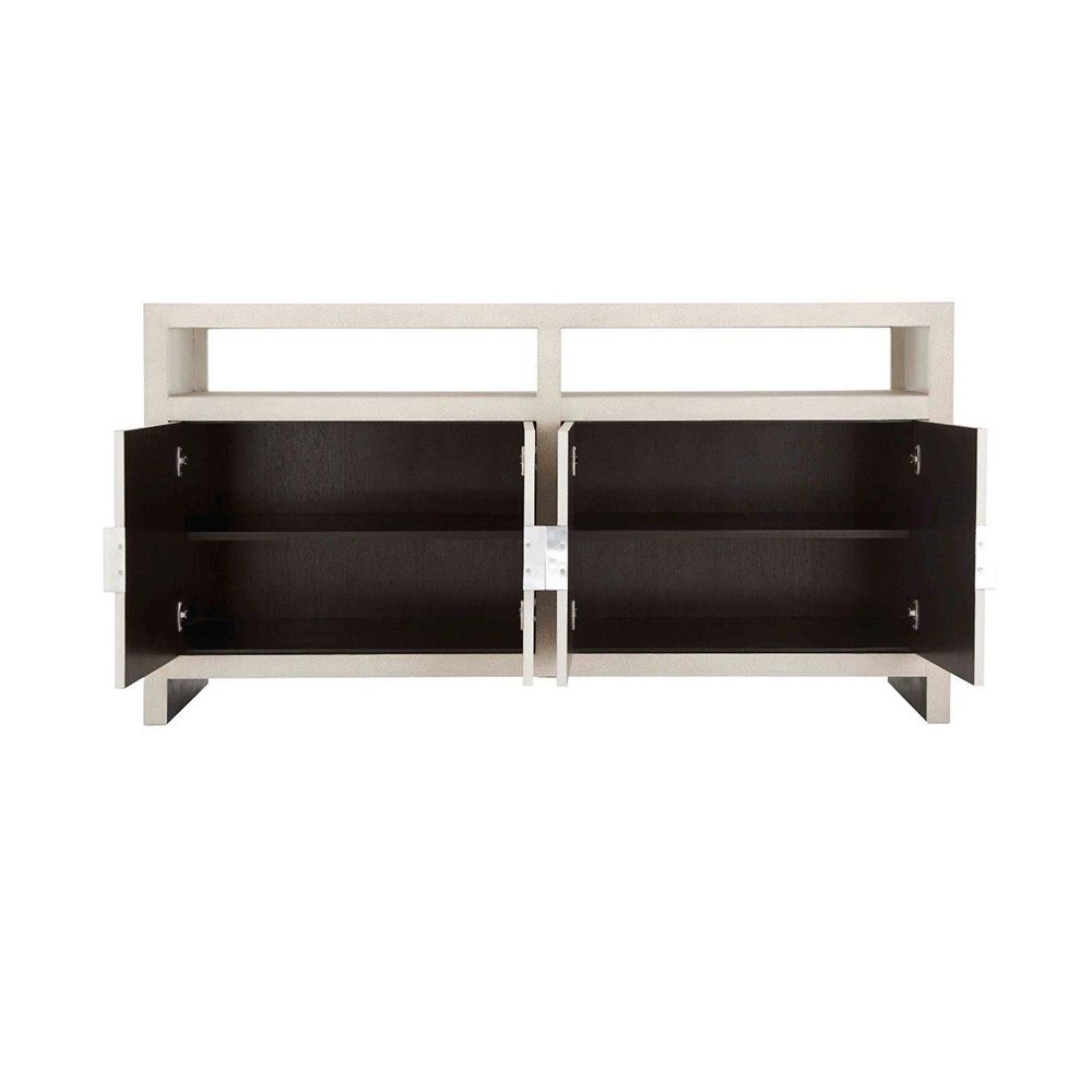 A beautiful buffet with a shagreen-embossed leather finish and inlaid metal handles