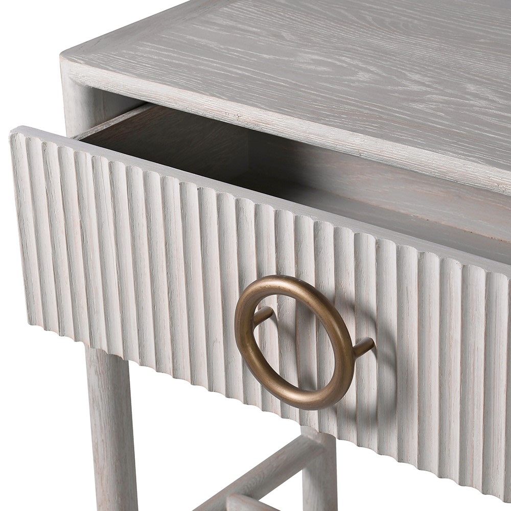White washed wood console table with brass finish handles