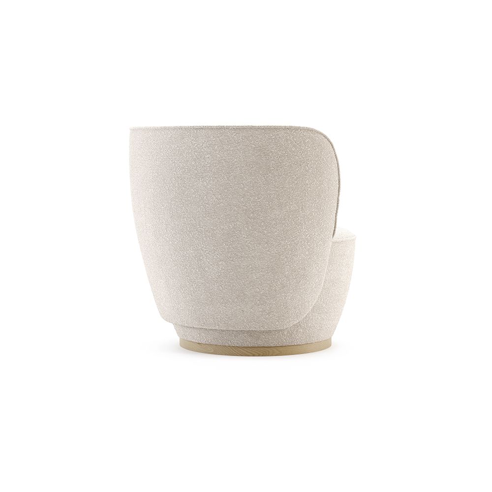 A glamorous Athenian-inspired armchair with a golden plinth