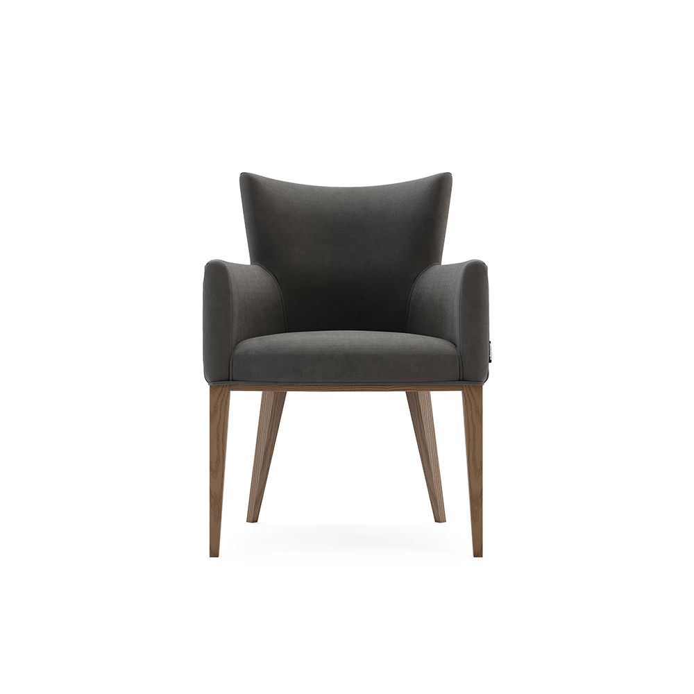 A chic modern mid-century modern dining armchair with wooden legs