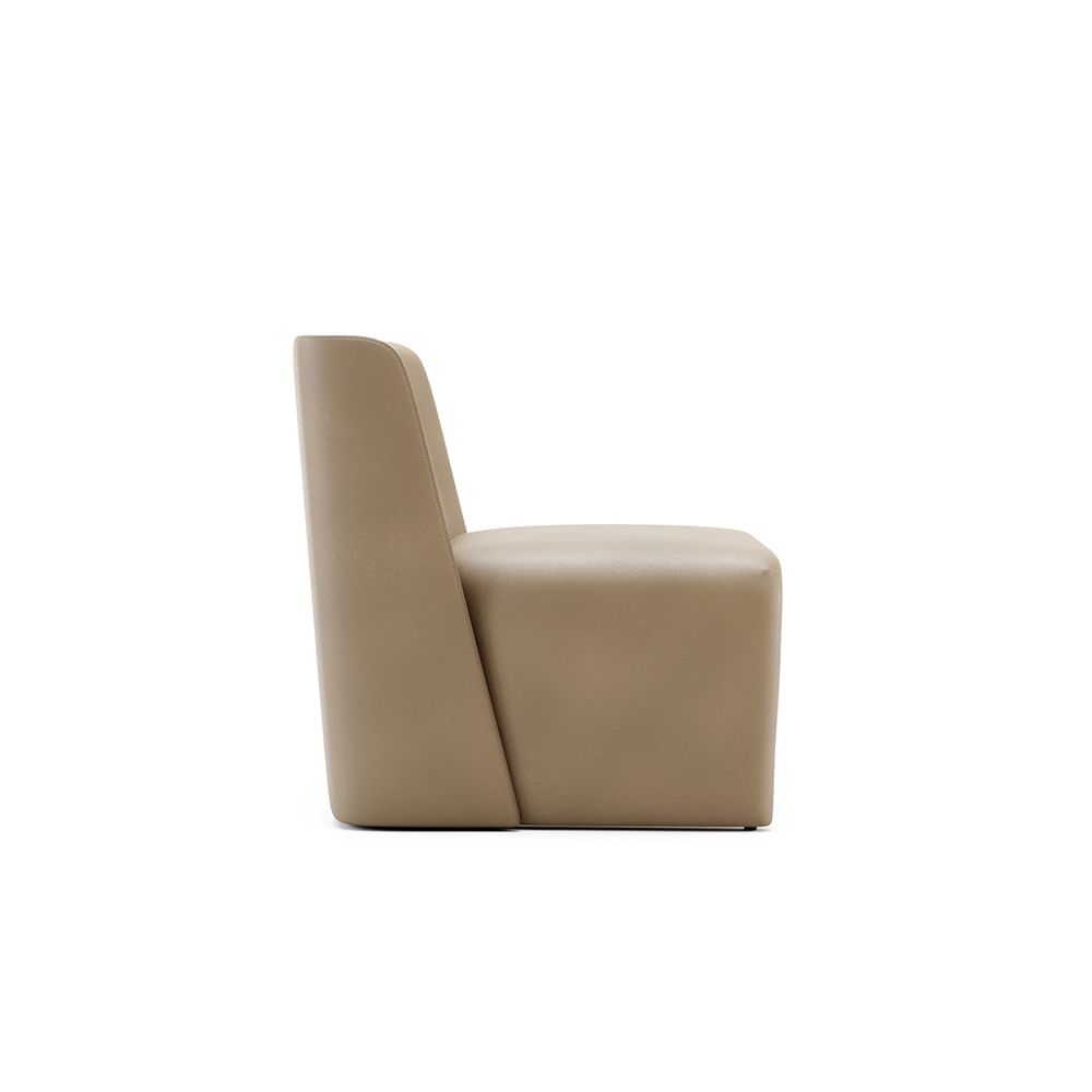 A stylishly sculptural armchair with a luxury leather upholstery