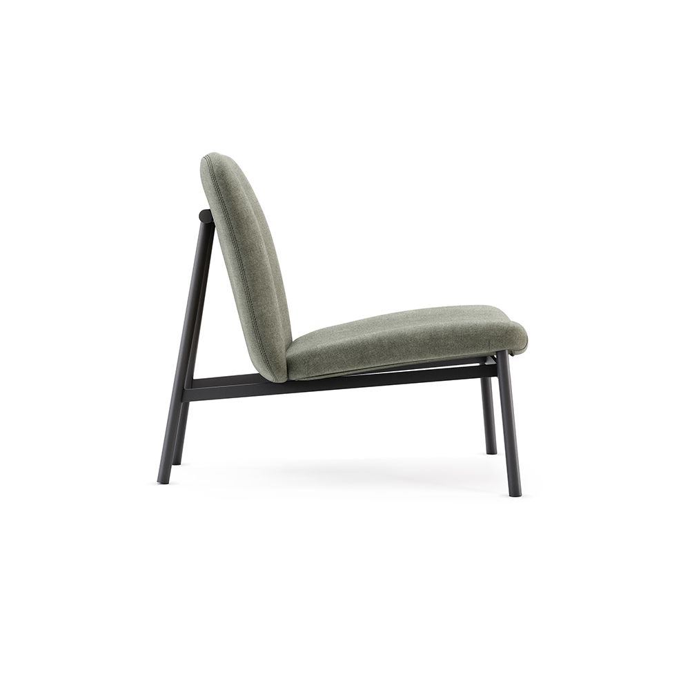 A luxurious contemporary velvet lounge chair with a black frame