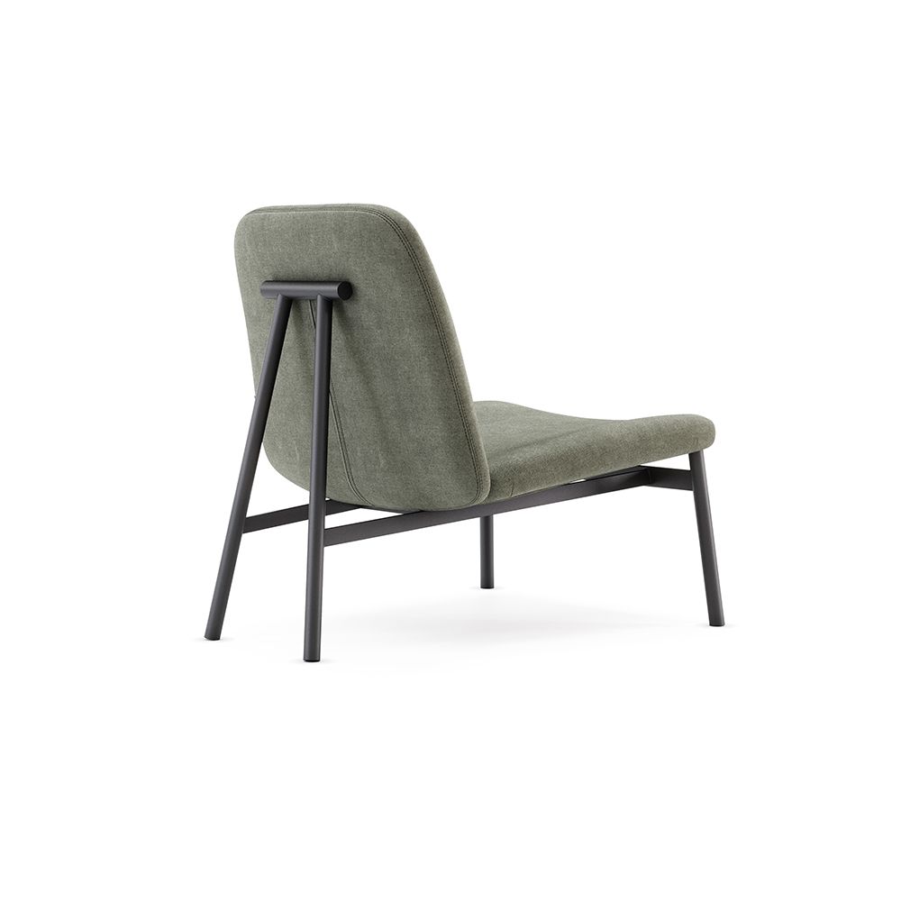 A luxurious contemporary velvet lounge chair with a black frame